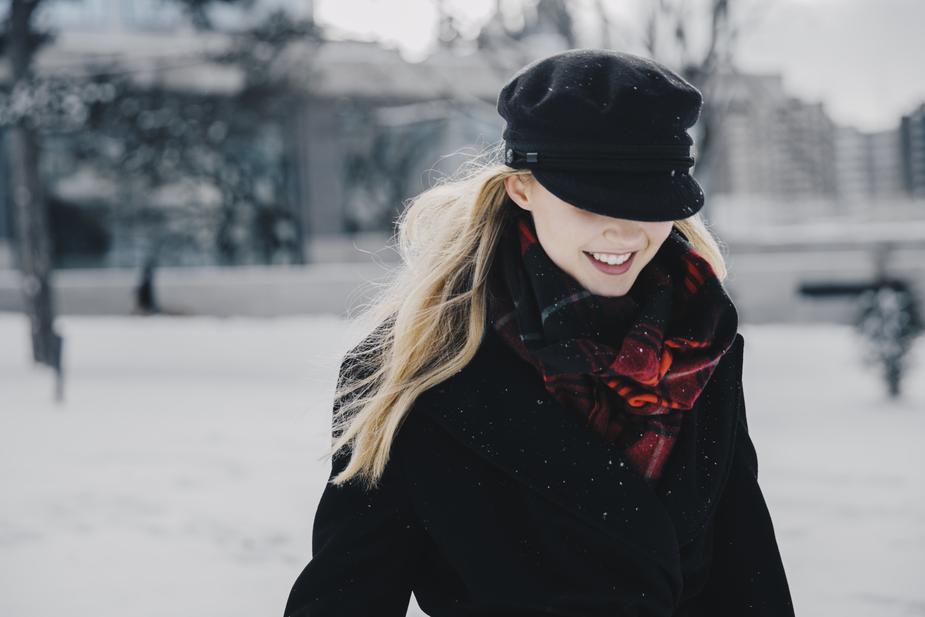 woman wearing black wool winter jacket